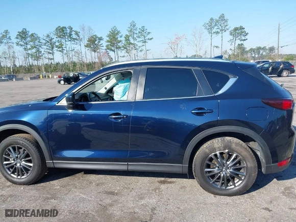 2019 Mazda CX-5 Touring with VIN JM3KFACM5K1608354, listed as a IAAI auction lot 41675828 with NaN miles. Bid and sale history available at carsss.com. Image 14.
