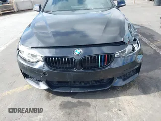2014 BMW 4 Series 428i with VIN WBA3N7C55EF719504, listed as a IAAI auction lot 41403957 with 98,882 mi miles and . Bid and sale history available at carsss.com. Image 12.