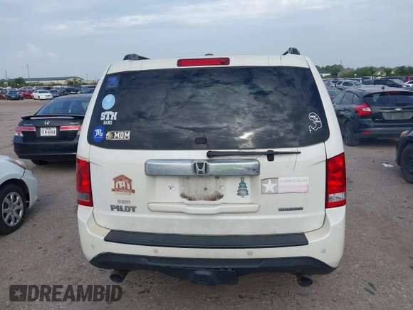 2013 Honda Pilot Touring with VIN 5FNYF3H95DB031130, listed as a IAAI auction lot 42669792 with 255,280 mi miles and . Bid and sale history available at DreamBid. Image 16.