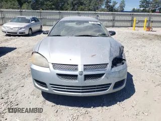2004 Dodge Stratus SXT z VIN 4B3AG42G64E146011, wystawiony jako Copart lot #70186364 z przebiegiem 184 795 mil mil oraz Szkody całkowita. Historia ofert i sprzedaży dostępna na DreamBid. Obrazek 5.