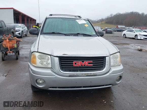 2006 GMC Envoy SLE z VIN 1GKDT13S562187698, wystawiony jako IAAI lot #41808778 z przebiegiem 167 023 mil mil oraz . Historia ofert i sprzedaży dostępna na DreamBid. Obrazek 12.