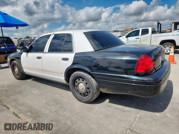 2010 Ford Police Interceptor with VIN 2FABP7BV0AX146445, listed as a Copart auction lot 62375055 with Not provided miles and Salvage title. Bid and sale history available at DreamBid. Image 2.