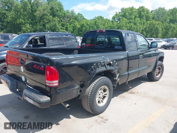 1999 Dodge Dakota SLT z VIN 1B7GG22YXXS304489, wystawiony jako IAAI lot #42326703 z przebiegiem 183 490 mil mil oraz . Historia ofert i sprzedaży dostępna na DreamBid. Obrazek 4.