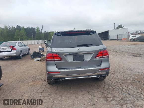 2016 Mercedes-Benz GLE 350 with VIN 4JGDA5JB8GA742920, listed as a IAAI auction lot 41957662 with 99,896 mi miles and . Bid and sale history available at DreamBid. Image 17.