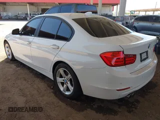 2014 BMW 3 Series 328i with VIN WBA3C1C52EK108503, listed as a IAAI auction lot 42258511 with 151,241 mi miles and . Bid and sale history available at DreamBid. Image 3.
