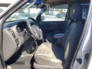 2004 Ford Escape XLS with VIN 1FMYU02184DA20455, listed as a Copart auction lot 73806544 with 322,565 mi miles and Clean Title. Bid and sale history available at DreamBid. Image 7.