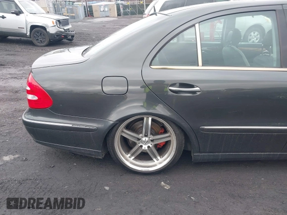 2003 Mercedes-Benz E 500 with VIN WDBUF70J73A189907, listed as a IAAI auction lot 41824651 with 126,466 mi miles and . Bid and sale history available at DreamBid. Image 6.