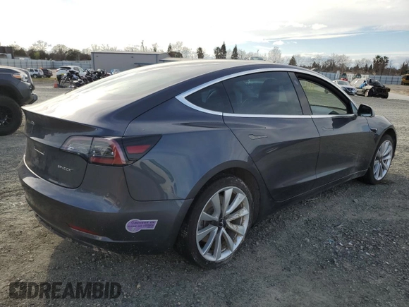 2019 Tesla Model 3 Mid Range with VIN 5YJ3E1EA3KF425416, listed as a Copart auction lot 46623325 with 84,060 mi miles and Salvage Title. Bid and sale history available at DreamBid. Image 3.