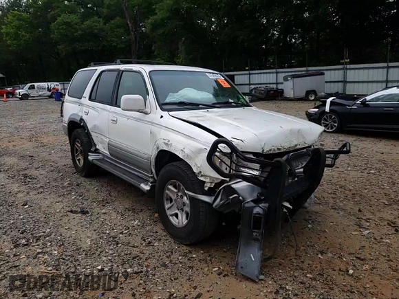 1999 Toyota 4Runner Limited z VIN JT3GN87R1X0100545, wystawiony jako Copart lot #57900635 z przebiegiem 215 408 mil mil oraz Szkoda całkowita • Salvage title. Historia ofert i sprzedaży dostępna na DreamBid. Obrazek 14.