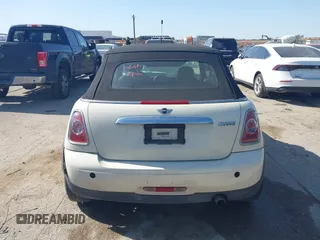 2013 MINI Convertible with VIN WMWZN3C58DT568824, listed as a IAAI auction lot 41998124 with 134,191 mi miles and . Bid and sale history available at DreamBid. Image 16.