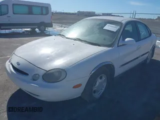 1996 Ford Taurus GL z VIN 1FALP52U0TG128147, wystawiony jako IAAI lot #41604450 z przebiegiem 152 949 mil mil oraz . Historia ofert i sprzedaży dostępna na DreamBid. Obrazek 2.