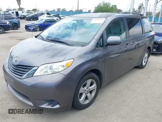 2011 Toyota Sienna LE AAS with VIN 5TDKK3DC8BS073125, listed as a IAAI auction lot 42018649 with 199,595 mi miles. Bid and sale history available at carsss.com. Image 2.