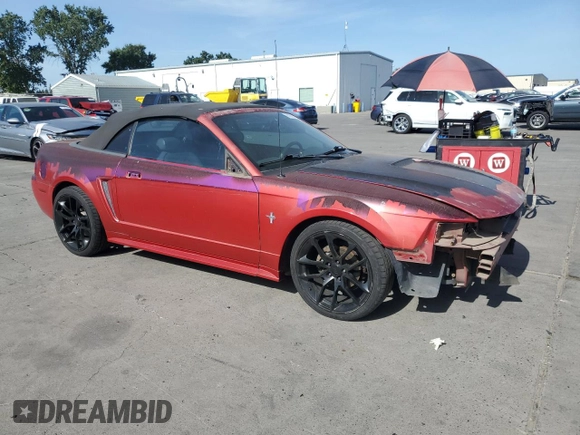 2002 Ford Mustang Deluxe with VIN 1FAFP44462F174929, listed as a Copart auction lot 61975925 with 110,825 mi miles and Salvage title. Bid and sale history available at DreamBid. Image 4.