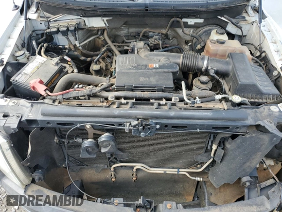 2010 Ford F-150 XL with VIN 1FTMF1CW4AKB46235, listed as a Copart auction lot 56931335 with 117,402 mi miles and Salvage title. Bid and sale history available at DreamBid. Image 11.