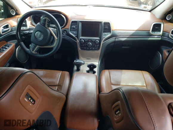 2015 Jeep Grand Cherokee Summit with VIN 1C4RJFJTXFC661574, listed as a Copart auction lot 65592954 with 110,791 mi miles and Salvage Title. Bid and sale history available at carsss.com. Image 8.