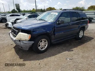 2003 Jeep Grand Cherokee Laredo z VIN 1J4GW48S93C519913, wystawiony jako Copart lot #46532103 z przebiegiem 247 725 mil mil oraz Szkoda całkowita • Salvage title. Historia ofert i sprzedaży dostępna na DreamBid. Obrazek 1.