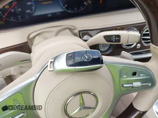 2018 Mercedes-Benz S 560 z VIN WDDUG8DB0JA389005, wystawiony jako IAAI lot #41939490 z przebiegiem 30 611 mil mil oraz . Historia ofert i sprzedaży dostępna na DreamBid. Obrazek 11.