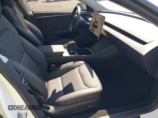 2025 Tesla Model 3 Long Range with VIN 5YJ3E1EB3SF914858, listed as a IAAI auction lot 42719707 with 5,849 mi miles and . Bid and sale history available at DreamBid. Image 5.