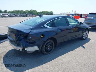 2017 Chevrolet Impala LT with VIN 2G1105S37H9117271, listed as a IAAI auction lot 40075008 with 156,972 mi miles and . Bid and sale history available at DreamBid. Image 4.