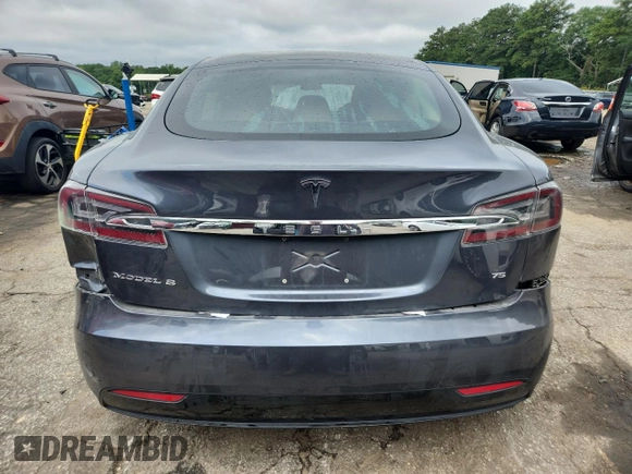 2017 Tesla Model S 60 z VIN 5YJSA1E18HF193461, wystawiony jako Copart lot #61040785 z przebiegiem 99 100 mil mil oraz Szkoda całkowita • Salvage title. Historia ofert i sprzedaży dostępna na DreamBid. Obrazek 6.