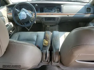 2007 Ford Crown Victoria LX with VIN 2FAFP74V47X119952, listed as a Copart auction lot 71025704 with 220,034 mi miles and Salvage Title. Bid and sale history available at carsss.com. Image 8.