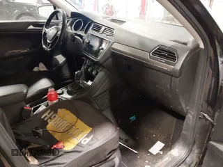 2019 Volkswagen Tiguan SE with VIN 3VV2B7AX3KM017948, listed as a IAAI auction lot 41564360 with 129,302 mi miles and . Bid and sale history available at DreamBid. Image 5.