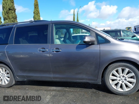 2013 Toyota Sienna XLE with VIN 5TDDK3DCXDS059061, listed as a IAAI auction lot 41777329 with 142,889 mi miles and . Bid and sale history available at DreamBid. Image 13.