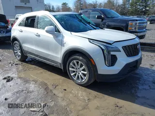 2022 Cadillac XT4 AWD Luxury with VIN 1GYFZBR4XNF158619, listed as a IAAI auction lot 41696017 with 58,466 mi miles and . Bid and sale history available at carsss.com. Image 1.
