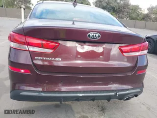 2019 Kia Optima LX with VIN 5XXGT4L36KG284965, listed as a IAAI auction lot 40374239 with 64,351 mi miles. Bid and sale history available at carsss.com. Image 6.