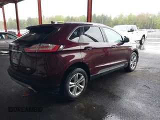 2019 Ford Edge SEL z VIN 2FMPK4J96KBB18838, wystawiony jako IAAI lot #42237001 z przebiegiem 72 875 mil mil oraz . Historia ofert i sprzedaży dostępna na DreamBid. Obrazek 4.
