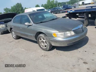 2000 Lincoln Continental with VIN 1LNHM97V0YY840446, listed as a IAAI auction lot 42596533 with 157,781 mi miles and . Bid and sale history available at DreamBid. Image 1.