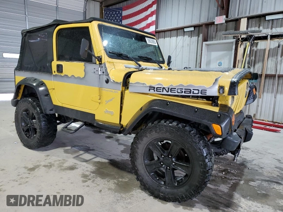 2002 Jeep Wrangler Sport z VIN 1J4FA49S02P730417, wystawiony jako Copart lot #59620865 z przebiegiem Nie podano mil oraz Szkoda całkowita • Salvage title. Historia ofert i sprzedaży dostępna na DreamBid. Obrazek 4.