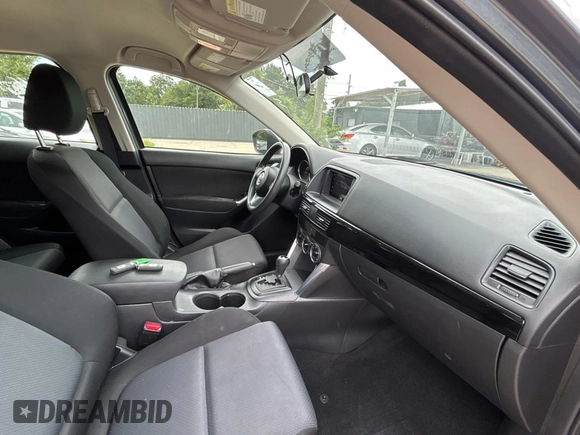 2013 Mazda CX-5 Sport with VIN JM3KE4BE7D0141588, listed as a Copart auction lot 66138585 with 124,920 mi miles and Clean title. Bid and sale history available at DreamBid. Image 5.