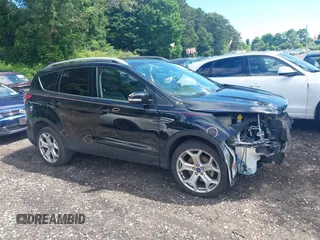 2018 Ford Escape Titanium with VIN 1FMCU9J94JUC98805, listed as a IAAI auction lot 42718214 with 36,689 mi miles and . Bid and sale history available at DreamBid. Image 13.