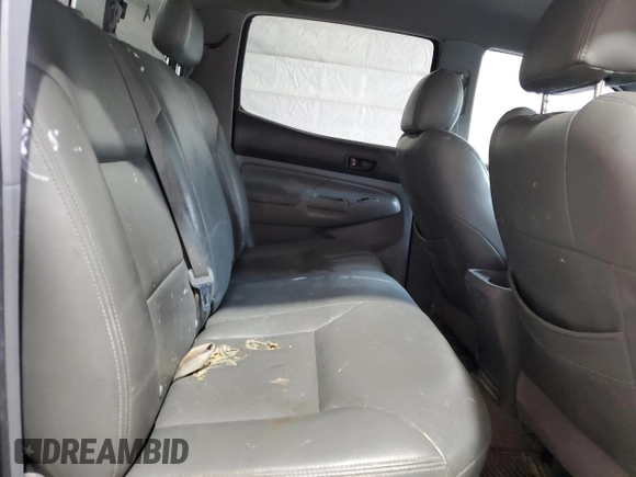 2007 Toyota Tacoma z VIN 5TEMU52N27Z372431, wystawiony jako Copart lot #56699575 z przebiegiem 284 462 mil mil oraz Szkoda całkowita • Salvage title. Historia ofert i sprzedaży dostępna na DreamBid. Obrazek 10.
