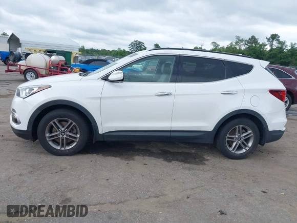 2018 Hyundai Santa Fe 2.4L z VIN 5XYZUDLB1JG543837, wystawiony jako IAAI lot #42235471 z przebiegiem 157 909 mil mil oraz . Historia ofert i sprzedaży dostępna na DreamBid. Obrazek 14.