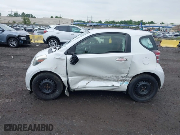 2012 Scion iQ with VIN JTNJJXB08CJ019333, listed as a IAAI auction lot 42348785 with 138,501 mi miles and . Bid and sale history available at DreamBid. Image 14.