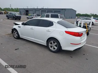 2014 Kia Optima LX with VIN KNAGM4A7XE5481131, listed as a IAAI auction lot 42494495 with 97,223 mi miles and . Bid and sale history available at DreamBid. Image 3.