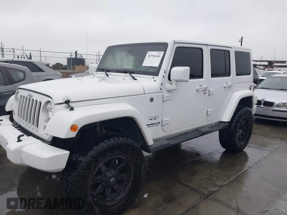 2016 Jeep Wrangler Unlimited Sahara with VIN 1C4HJWEG8GL240950, listed as a IAAI auction lot 41443059 with Not provided miles and . Bid and sale history available at DreamBid. Image 2.