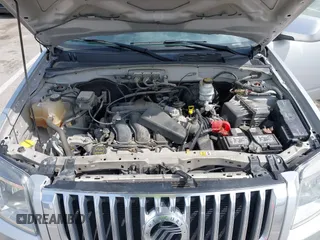 2008 Mercury Mariner Premier with VIN 4M2CU97198KJ12620, listed as a IAAI auction lot 41909389 with 131,884 mi miles and . Bid and sale history available at DreamBid. Image 10.