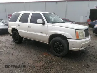 2003 Cadillac Escalade z VIN 1GYEK63N33R136014, wystawiony jako IAAI lot #42339902 z przebiegiem 280 136 mil mil oraz . Historia ofert i sprzedaży dostępna na DreamBid. Obrazek 1.