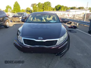 2013 Kia Optima LX with VIN 5XXGM4A71DG124725, listed as a IAAI auction lot 42041768 with 184,181 mi miles and . Bid and sale history available at carsss.com. Image 12.