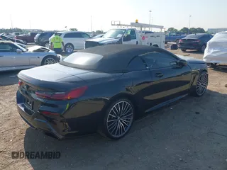2022 BMW 8 Series with VIN WBAFY4C04NCJ78602, listed as a IAAI auction lot 42034279 with 11,757 mi miles and . Bid and sale history available at DreamBid. Image 4.