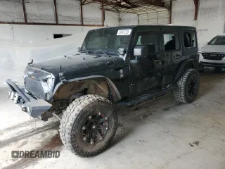 2012 Jeep Wrangler Unlimited Sahara with VIN 1C4BJWEG3CL195271, listed as a Copart auction lot 59947235 with 212,819 mi miles and Salvage title. Bid and sale history available at DreamBid. Image 1.