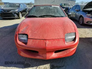 1998 Pontiac Sunfire z VIN 4G2JB32T7WB202549, wystawiony jako Copart lot #75095294 z przebiegiem 38 312 mil mil oraz Szkoda całkowita • Salvage title. Historia ofert i sprzedaży dostępna na DreamBid. Obrazek 5.