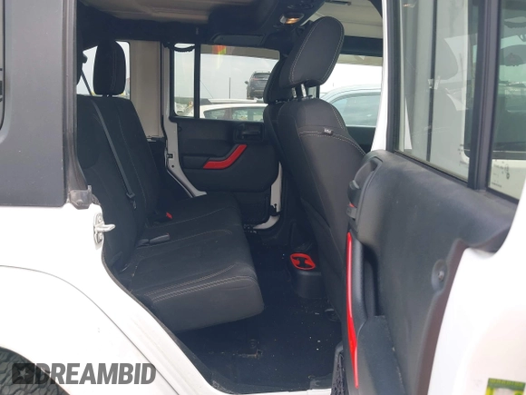 2018 Jeep Wrangler Unlimited Sahara with VIN 1C4HJWEG1JL801934, listed as a IAAI auction lot 42072968 with 112,432 mi miles and . Bid and sale history available at DreamBid. Image 8.