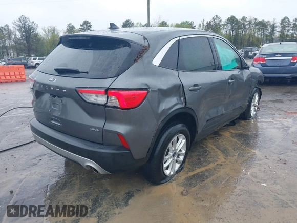 2022 Ford Escape SE Hybrid with VIN 1FMCU9BZ8NUB46840, listed as a IAAI auction lot 42006379 with 57,851 mi miles and . Bid and sale history available at carsss.com. Image 4.