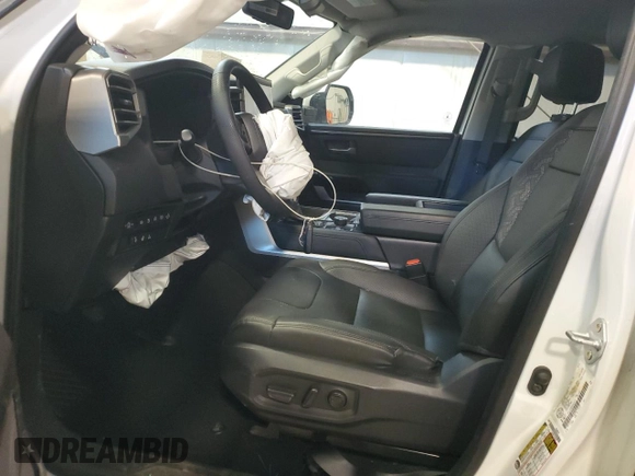 2023 Toyota Tundra Limited Hybrid with VIN 5TFJC5DB5PX015177, listed as a Copart auction lot 87896795 with 77,113 mi miles and Salvage title. Bid and sale history available at DreamBid. Image 7.