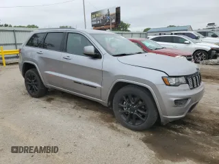 2021 Jeep Grand Cherokee Laredo X with VIN 1C4RJFAG6MC701505, listed as a Copart auction lot 54312755 with 79,519 mi miles and Salvage title. Bid and sale history available at DreamBid. Image 4.
