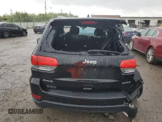 2018 Jeep Grand Cherokee Laredo E with VIN 1C4RJFAG5JC113283, listed as a Copart auction lot 57569595 with 90,897 mi miles and Salvage title. Bid and sale history available at DreamBid. Image 6.